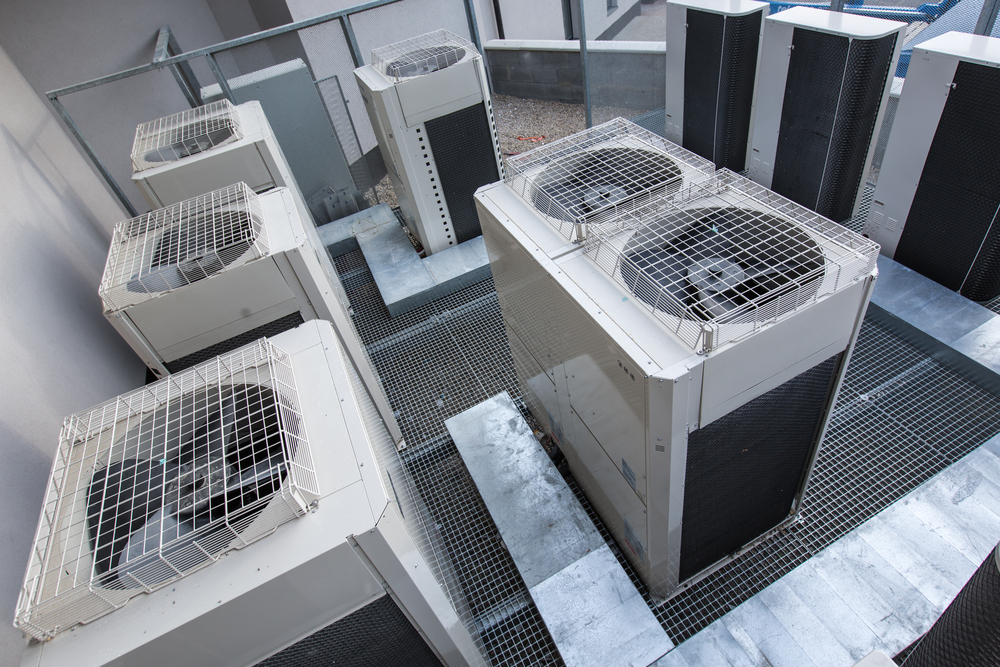 Air conditioning equipment atop a modern building – aerial/drone