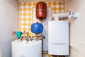 Vintage mansion - a boiler room with containers and pipes