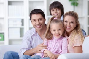 Happy family with children at home