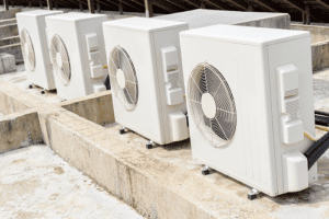 rooftop commercial air conditioning units attached to building rooftop