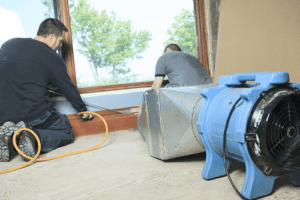 2 technician using duct cleaning equipment