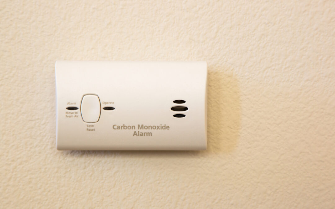 Carbon Monoxide Alarm Attached to Wall in House.